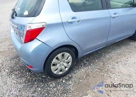 2013 Toyota Yaris Le z USA, uszkodzony, nr VIN JTDKTUD35DD568352